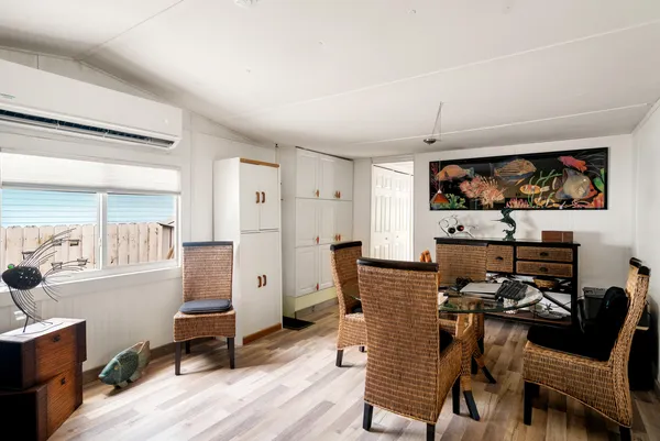 a view of a dining room with furniture