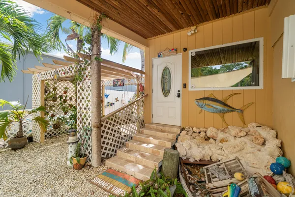 a view of entryway with wooden door