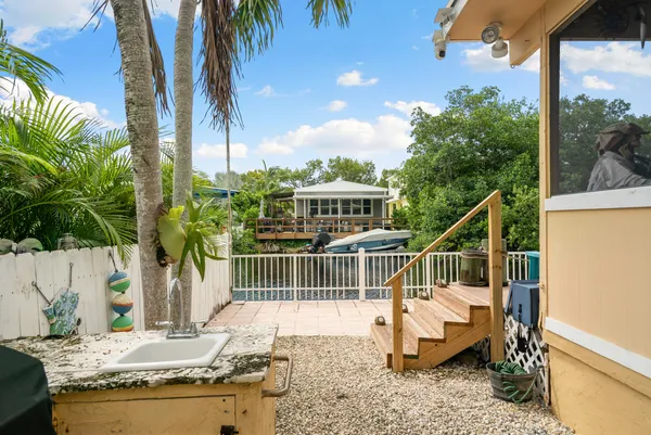 a view of a balcony with a lake view