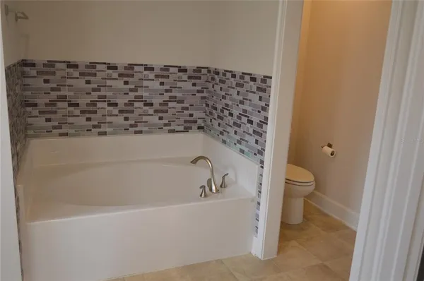 a bathroom with a bathtub