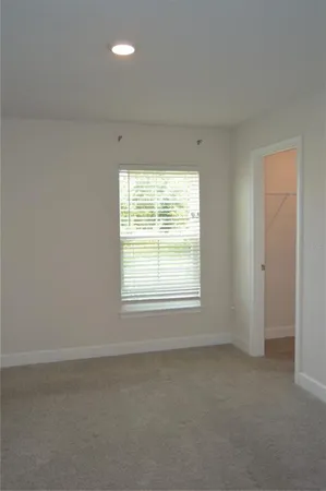 a view of front door and yard