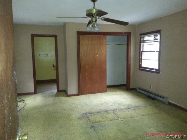 258 Raines Tavern Road Farmville, VA 23901 - Photo 6 of 13 a view of an empty room with a window