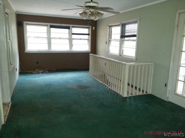258 Raines Tavern Road Farmville, VA 23901 - Photo 8 of 13 a view of an empty room with a window