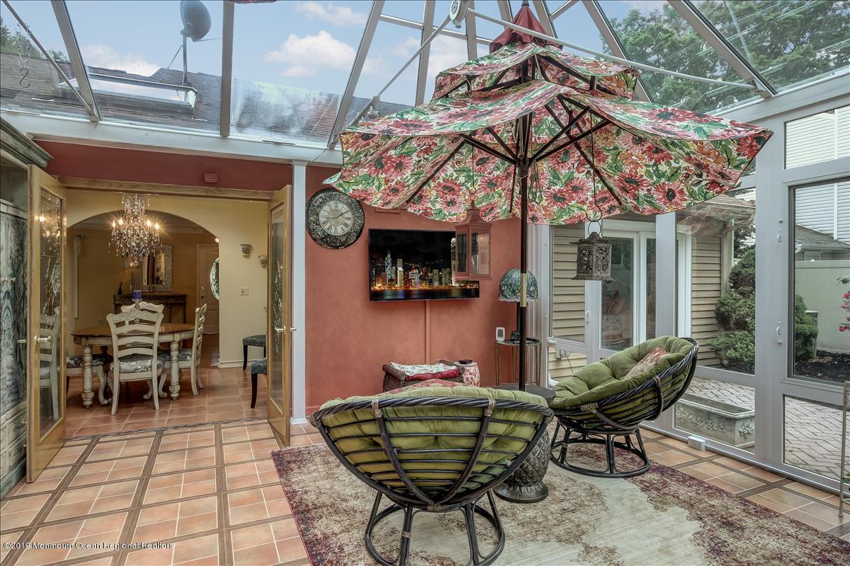 2301 Huckleberry Road Manchester Township, NJ 08759 - Photo 17 of 42 CONSERVATORY AND DINING ROOM