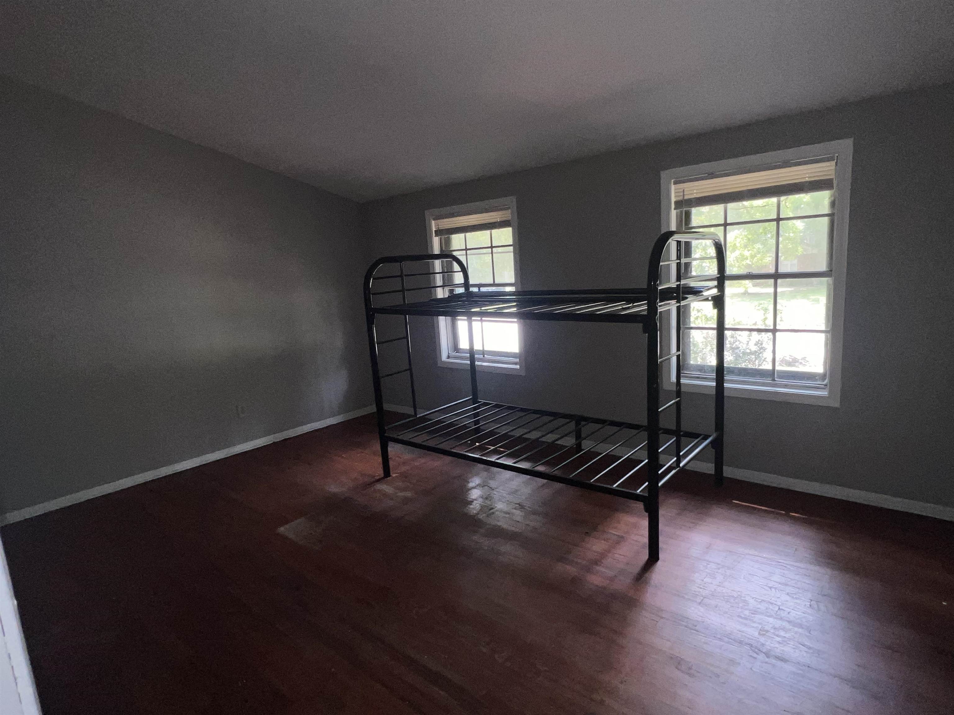 2950 Invergarry Road Memphis, TN 38128 - Photo 10 of 19 Unfurnished bedroom featuring hardwood / wood-style flooring