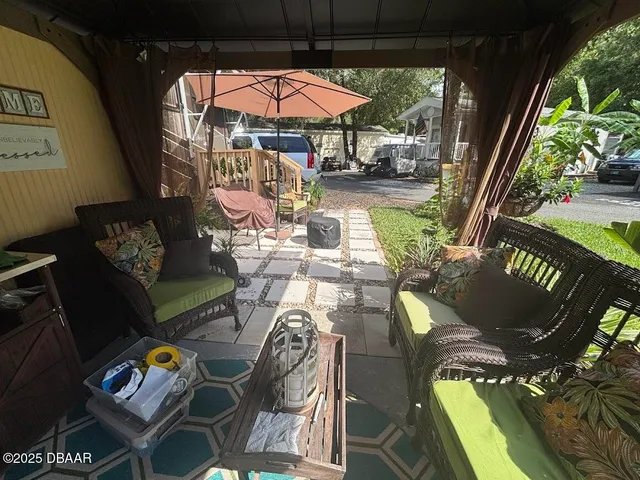 a view of a house with patio