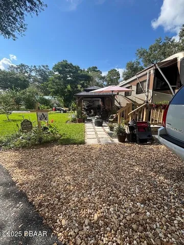 a view of a balcony with ocean view