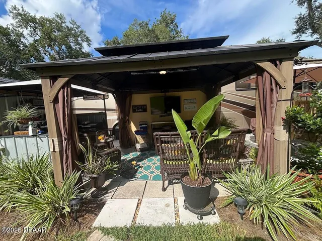 a view of a backyard of the house