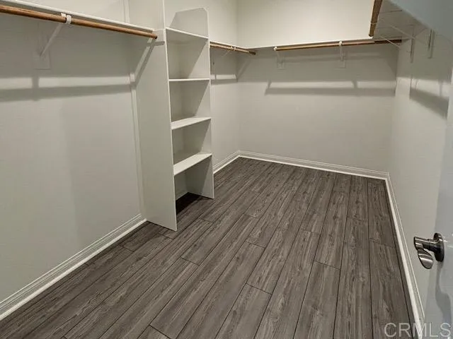 a view of an empty walk in closet