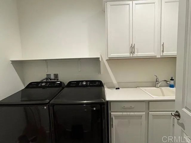 a view of a balcony furniture and wooden floor