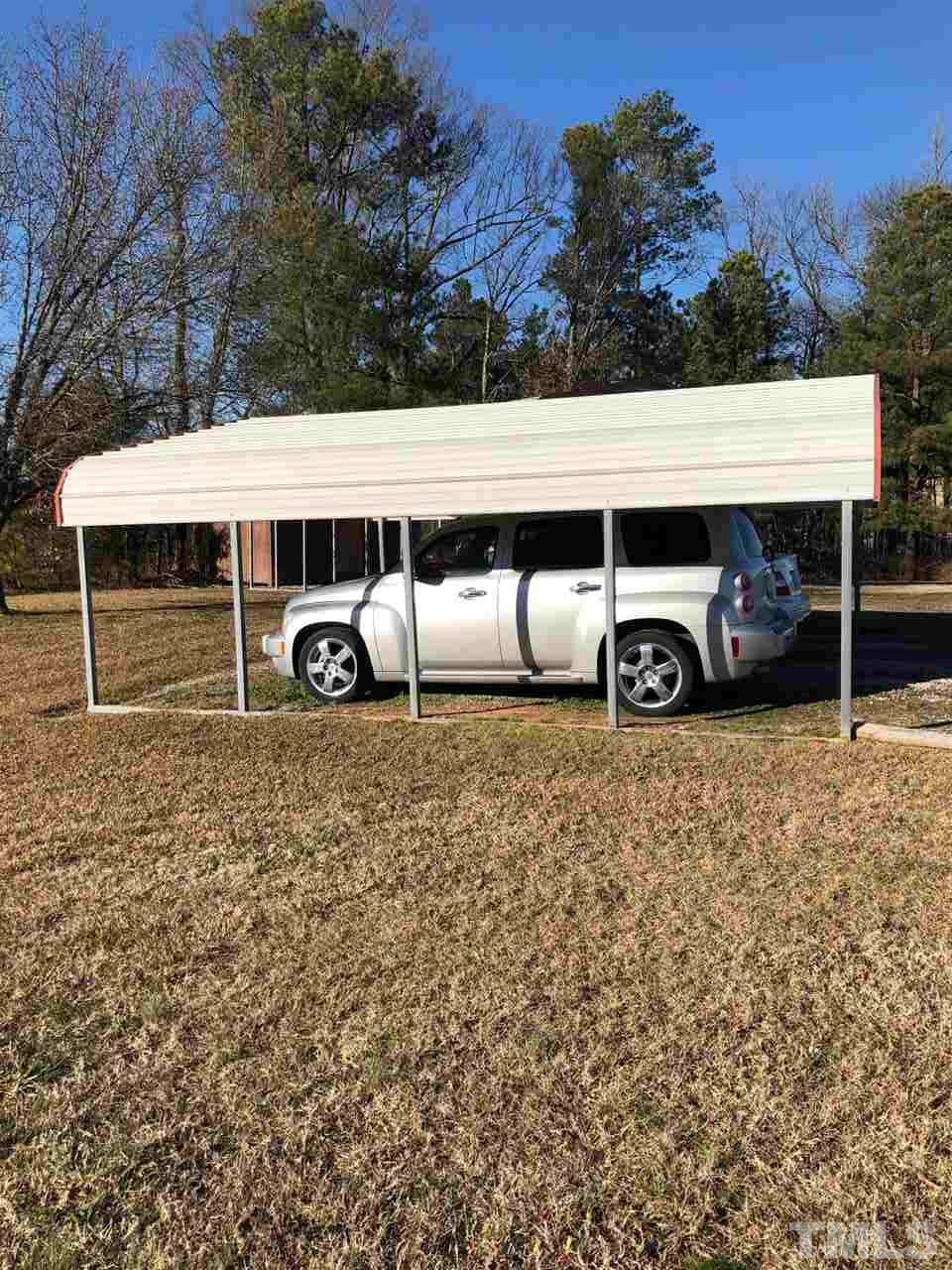 4603 Hopson Road Durham, NC 27703 - Photo 20 of 24 The lower carport will accommodate two cars.
