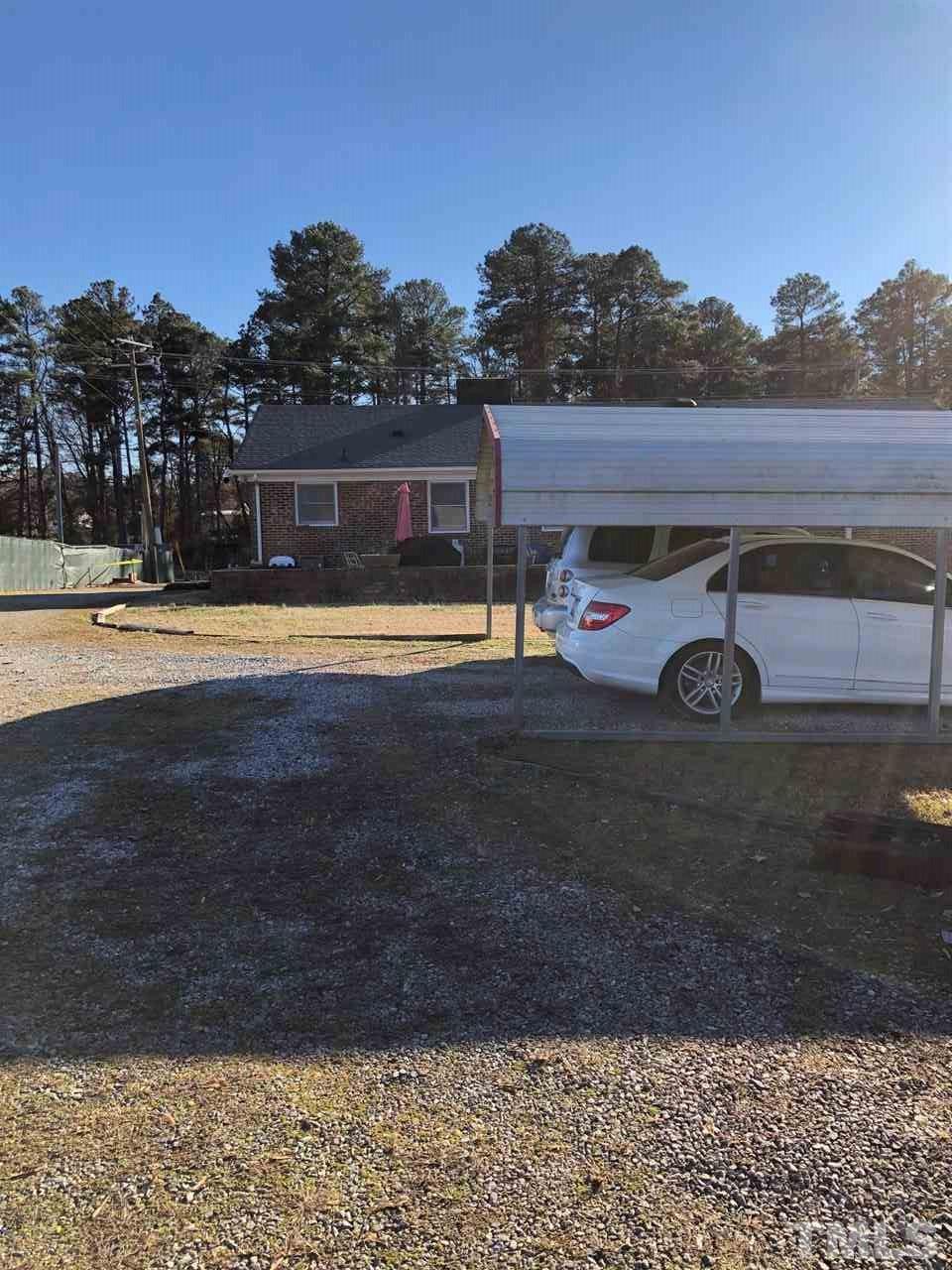 4603 Hopson Road Durham, NC 27703 - Photo 23 of 24 View from middle of back yard looking toward house.
