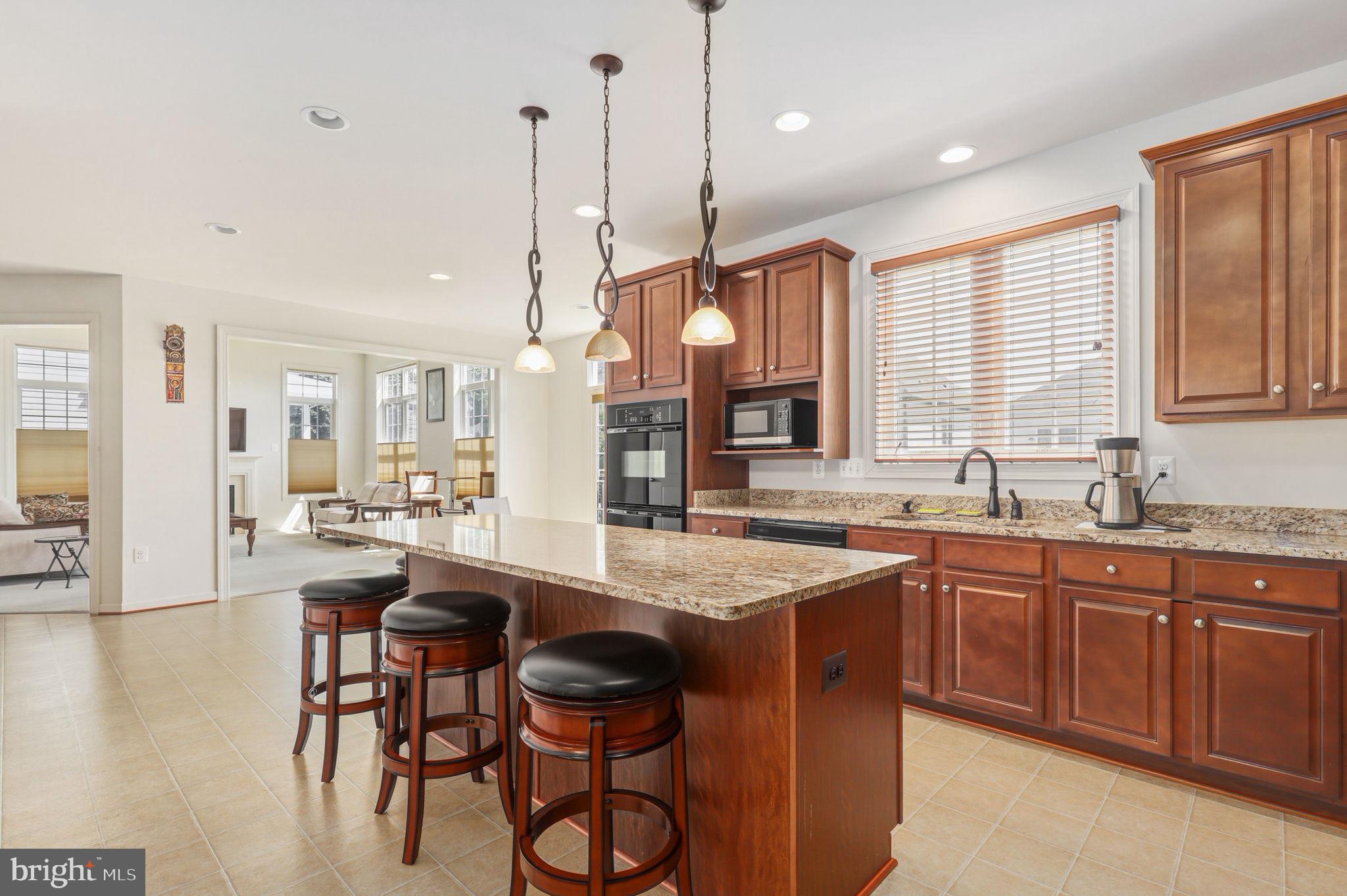 13621 Stargazer Lane Silver Spring, MD 20906 - Photo 11 of 66 Kitchen Island with Granite Counters