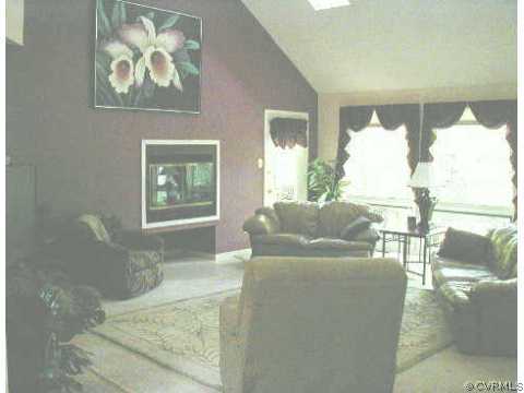 14104 Spring Gate Road Midlothian, VA 23112 - Photo 2 of 5 a living room with furniture and a large window