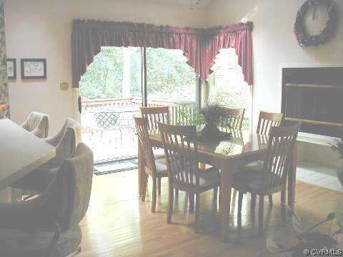 14104 Spring Gate Road Midlothian, VA 23112 - Photo 5 of 5 a view of a dining room with furniture window and outside view