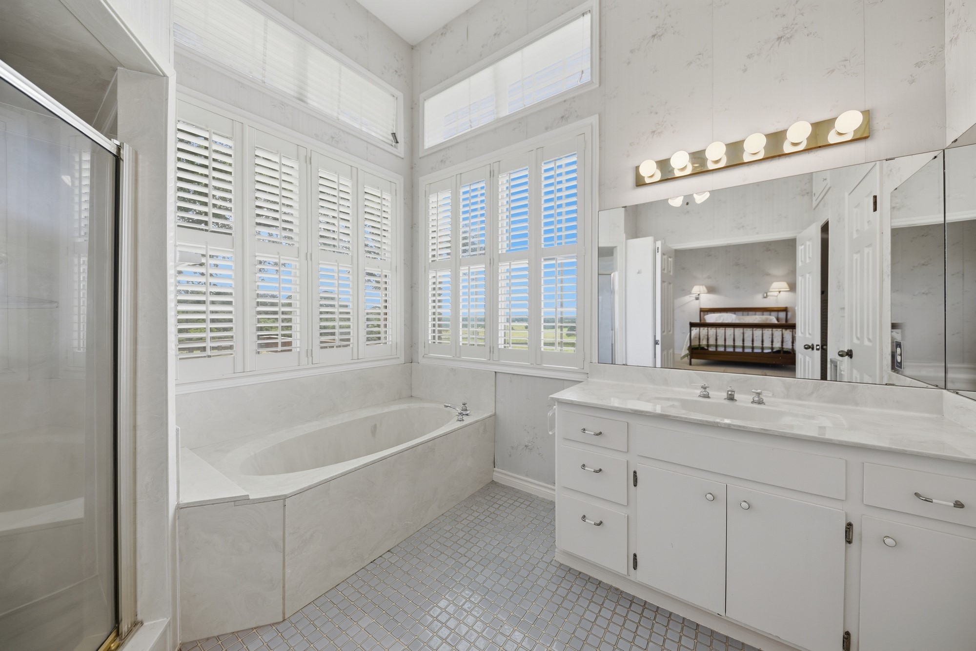 1552 Holub Road Schulenburg, TX 78956 - Photo 16 of 45 Primary Bathroom is 2 steps down from bedroom.