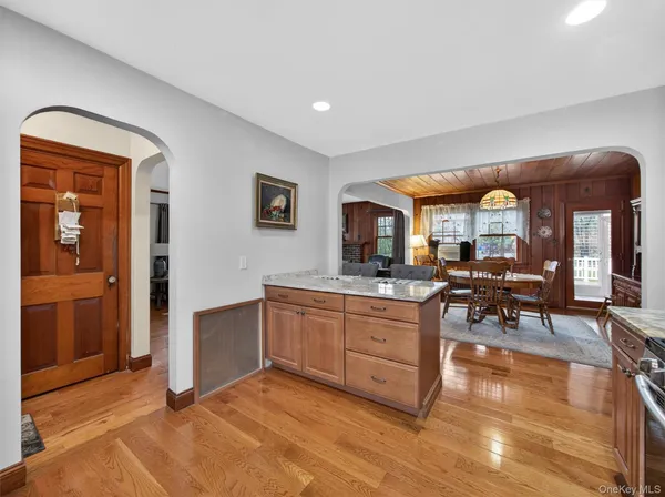 a very nice looking living room with kitchen