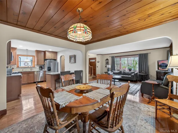 a view of a dining room with furniture