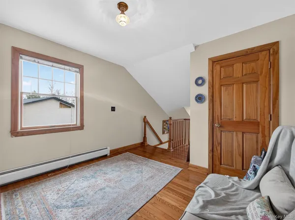 a view of livingroom with furniture and wooden floor