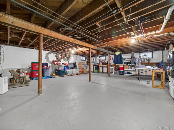 a view of parking garage with cars