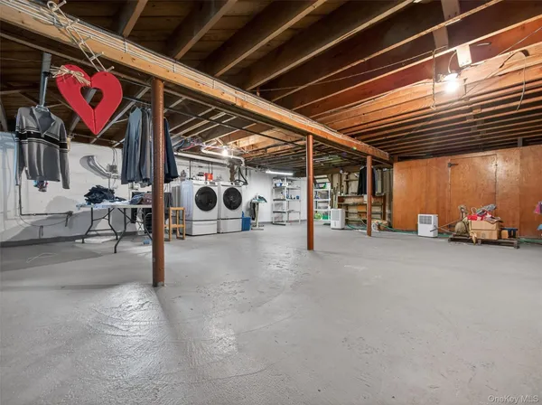 a view of a street with tables and chairs