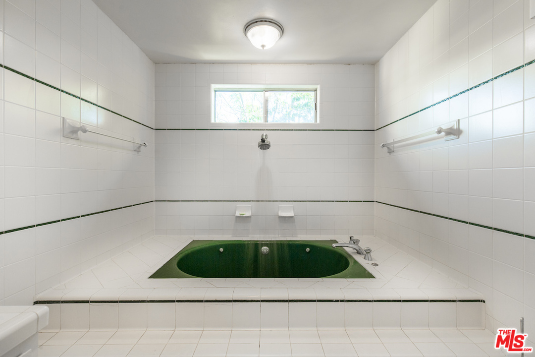 3012 Arrowhead Drive Los Angeles, CA 90068 - Photo 22 of 53 a bathroom with a sink and window