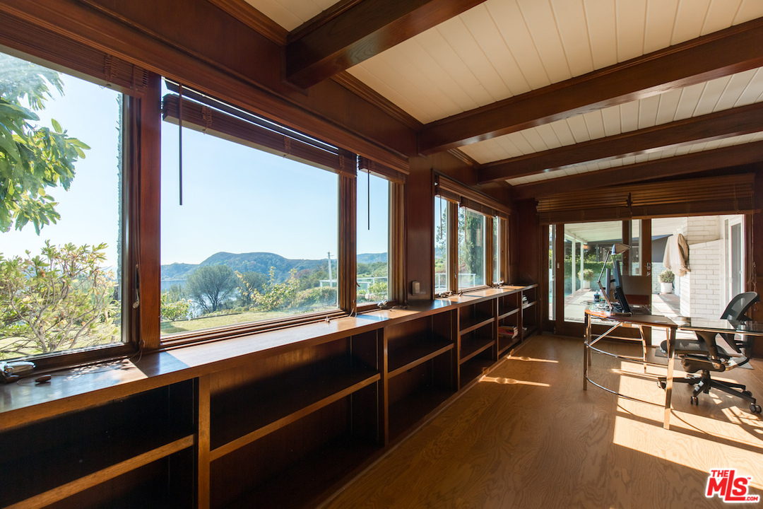 3012 Arrowhead Drive Los Angeles, CA 90068 - Photo 31 of 53 a large room with wooden floor and large windows