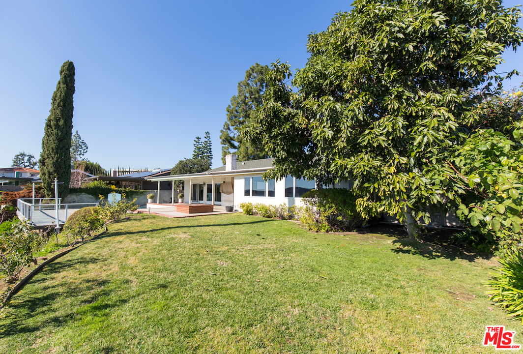 3012 Arrowhead Drive Los Angeles, CA 90068 - Photo 36 of 53 a front view of a house with a yard