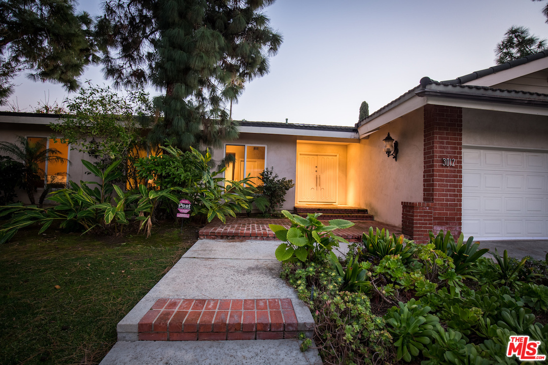 3012 Arrowhead Drive Los Angeles, CA 90068 - Photo 47 of 53 a front view of a house with garden