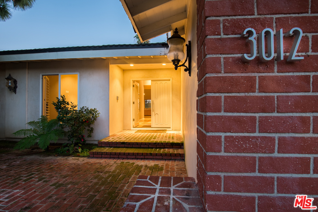 3012 Arrowhead Drive Los Angeles, CA 90068 - Photo 49 of 53 a view of a door with a potted plant