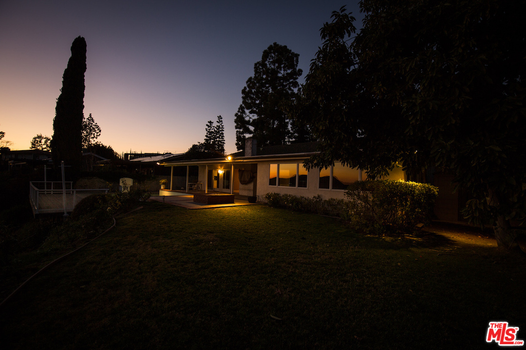 3012 Arrowhead Drive Los Angeles, CA 90068 - Photo 53 of 53 a front view of a house with a garden