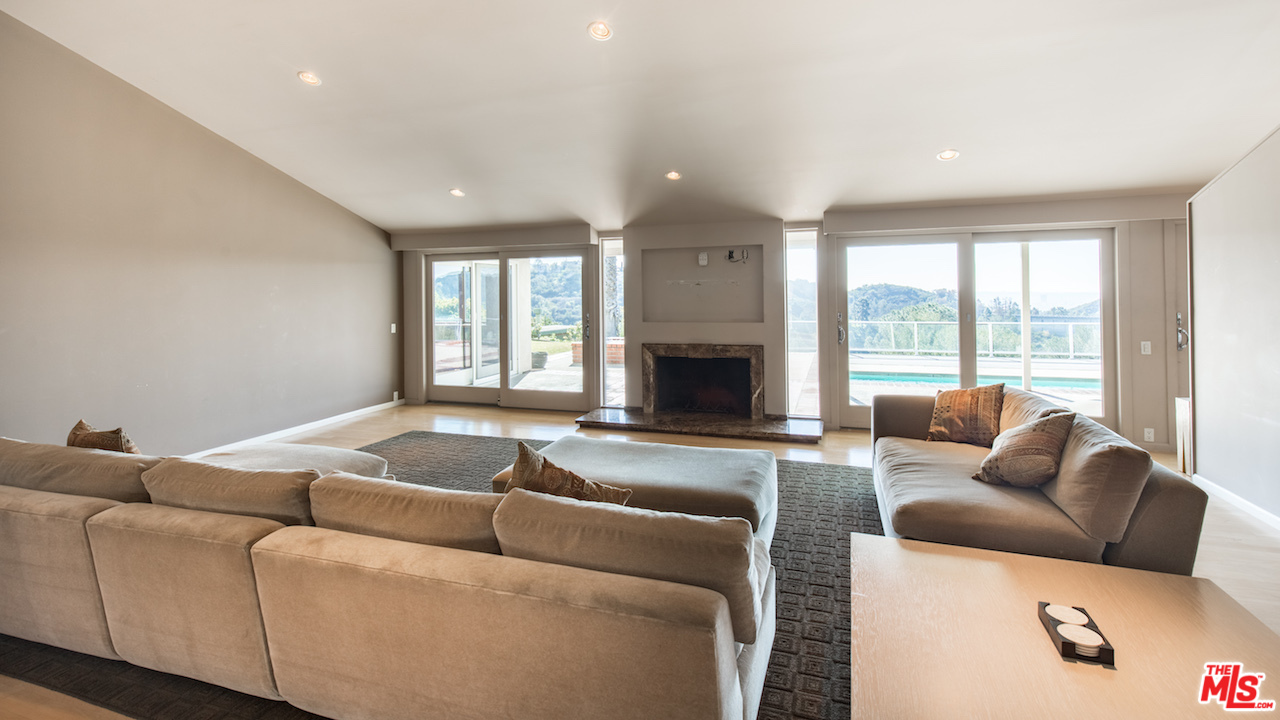 3012 Arrowhead Drive Los Angeles, CA 90068 - Photo 9 of 53 a living room with furniture and a fireplace