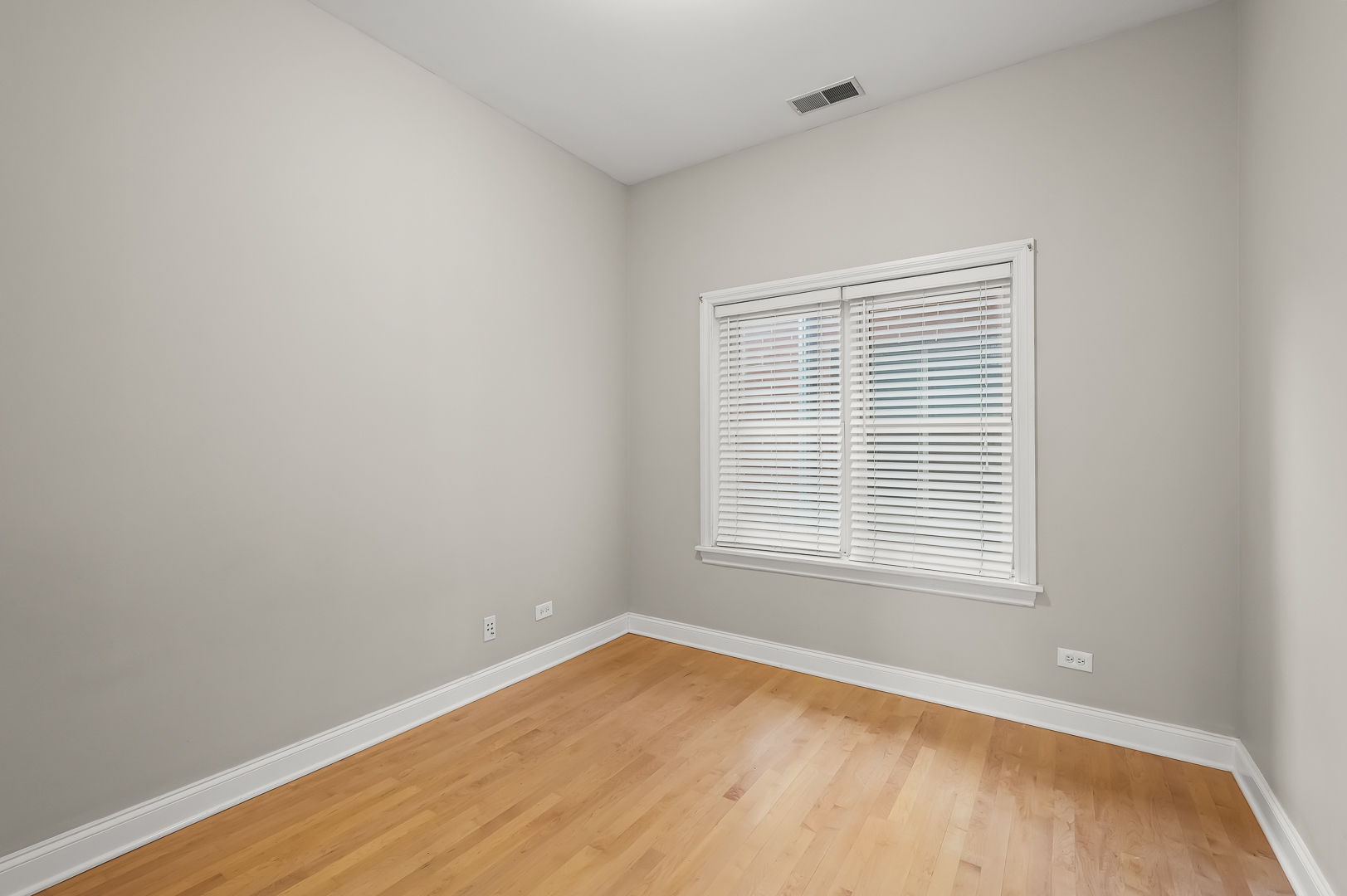 1408 West Taylor Street, Unit 301 Chicago, IL 60607 - Photo 18 of 21 a view of an empty room with a window