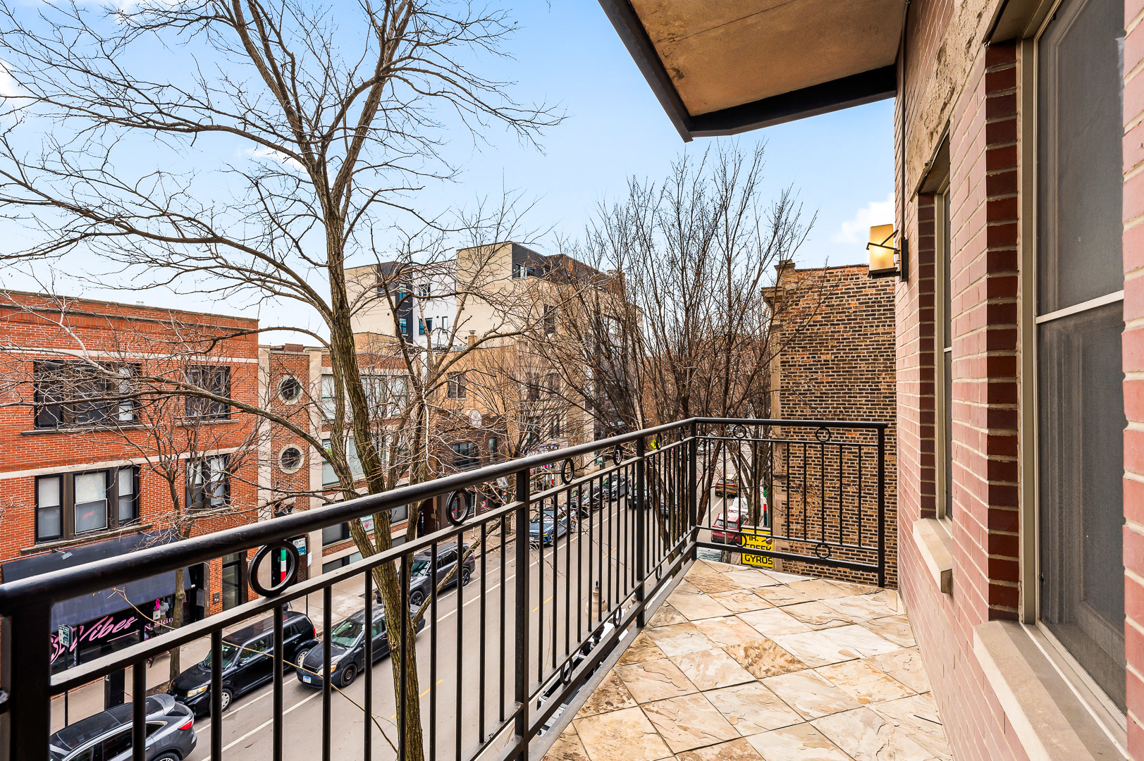 1408 West Taylor Street, Unit 301 Chicago, IL 60607 - Photo 2 of 21 a view of a balcony with a pot