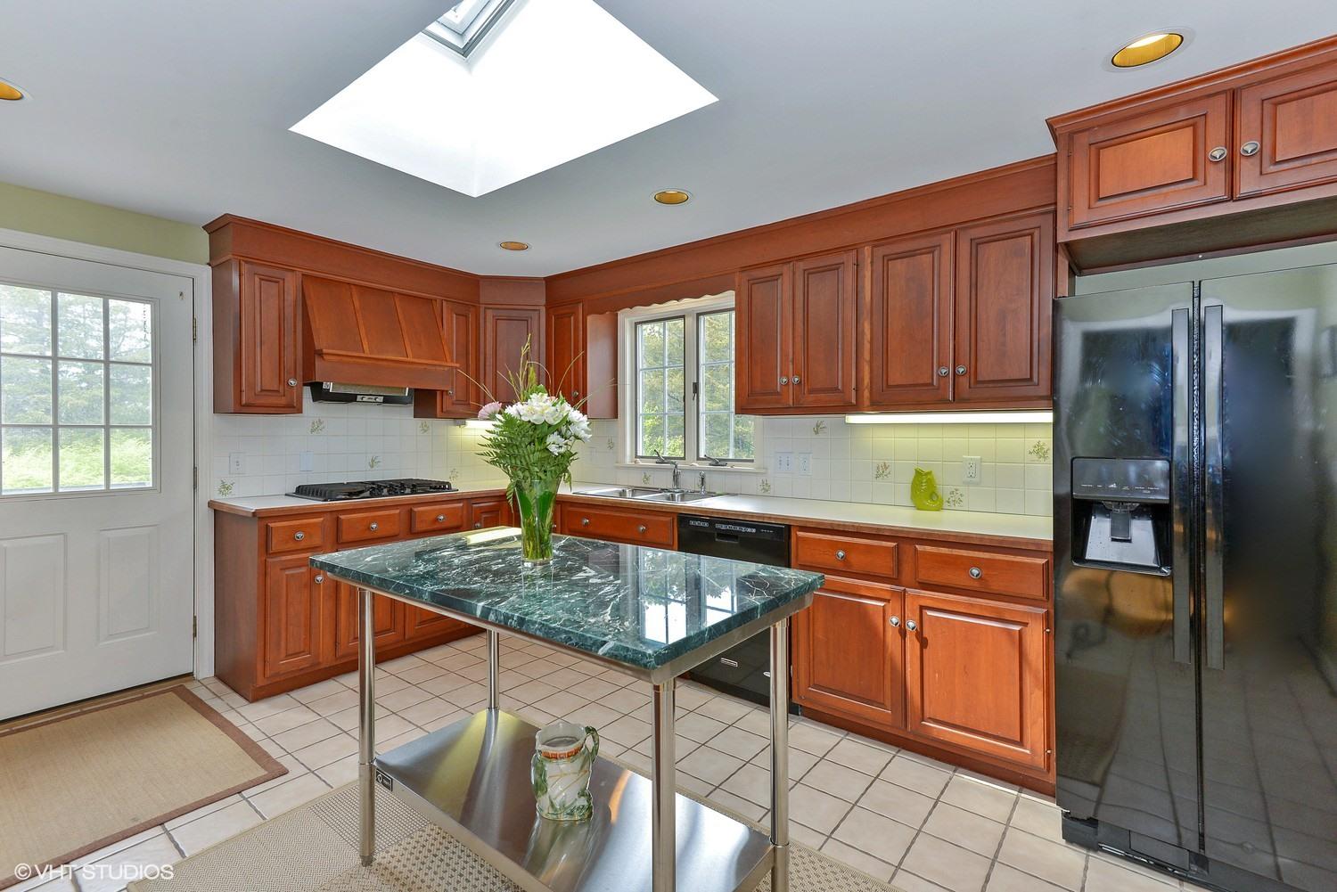 2055 Bridge Road Eastham, MA 02642 - Photo 4 of 22 a kitchen with stainless steel appliances granite countertop a stove a sink dishwasher and cabinets