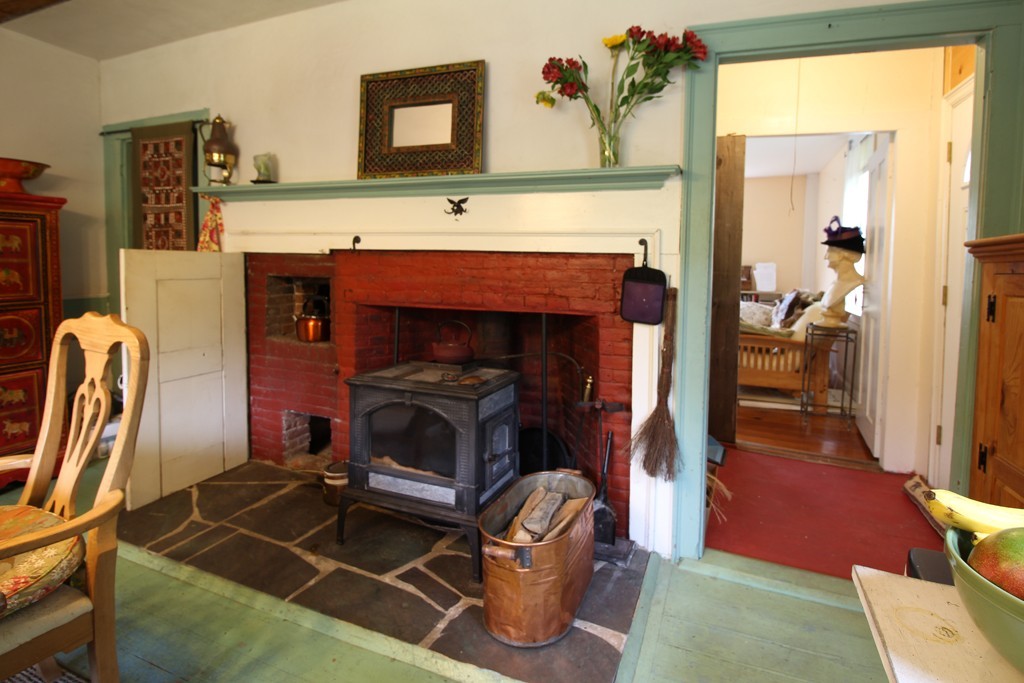 110 Ward Hill Road Phillipston, MA 01331 - Photo 4 of 16 a living room with furniture a flat screen tv and a fireplace