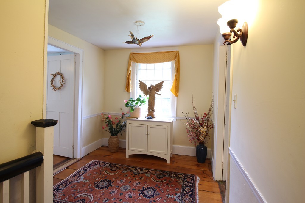 110 Ward Hill Road Phillipston, MA 01331 - Photo 8 of 16 a view of a hallway with a flower pot