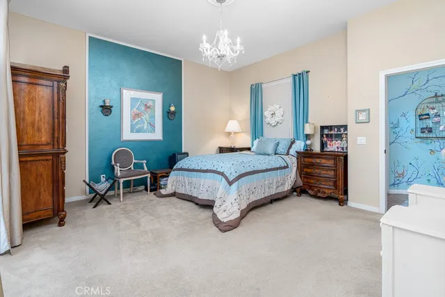 a kitchen with stainless steel appliances granite countertop a stove top oven a refrigerator a sink and dishwasher