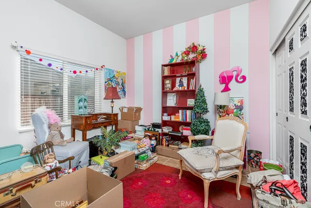 a bathroom with a toilet and a sink