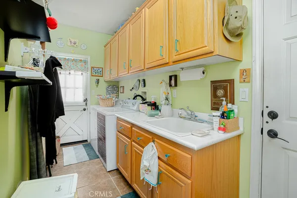 a bathroom with a sink a mirror and a shower