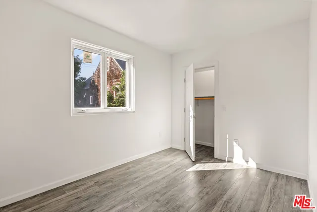 a view of wooden floor in an empty room