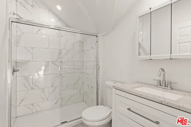 a view of a hallway with front door