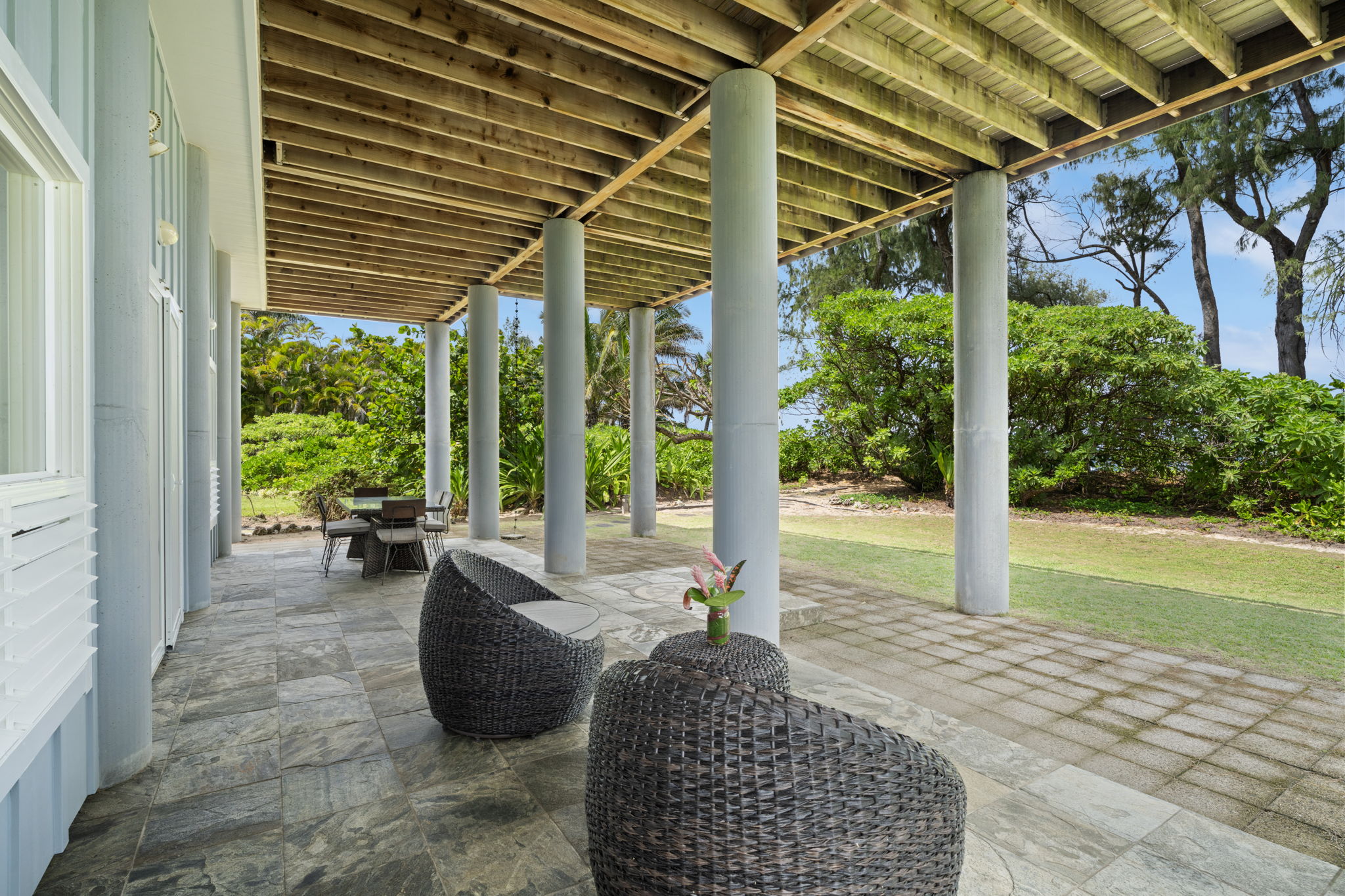 7312 Alealea Road Hanalei, HI 96714 - Photo 21 of 30 a living room with couch and a patio