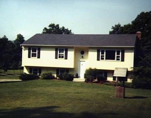 519 River Road New Milford, CT 06755 - Photo 1 of 1 a front view of a house with a garden