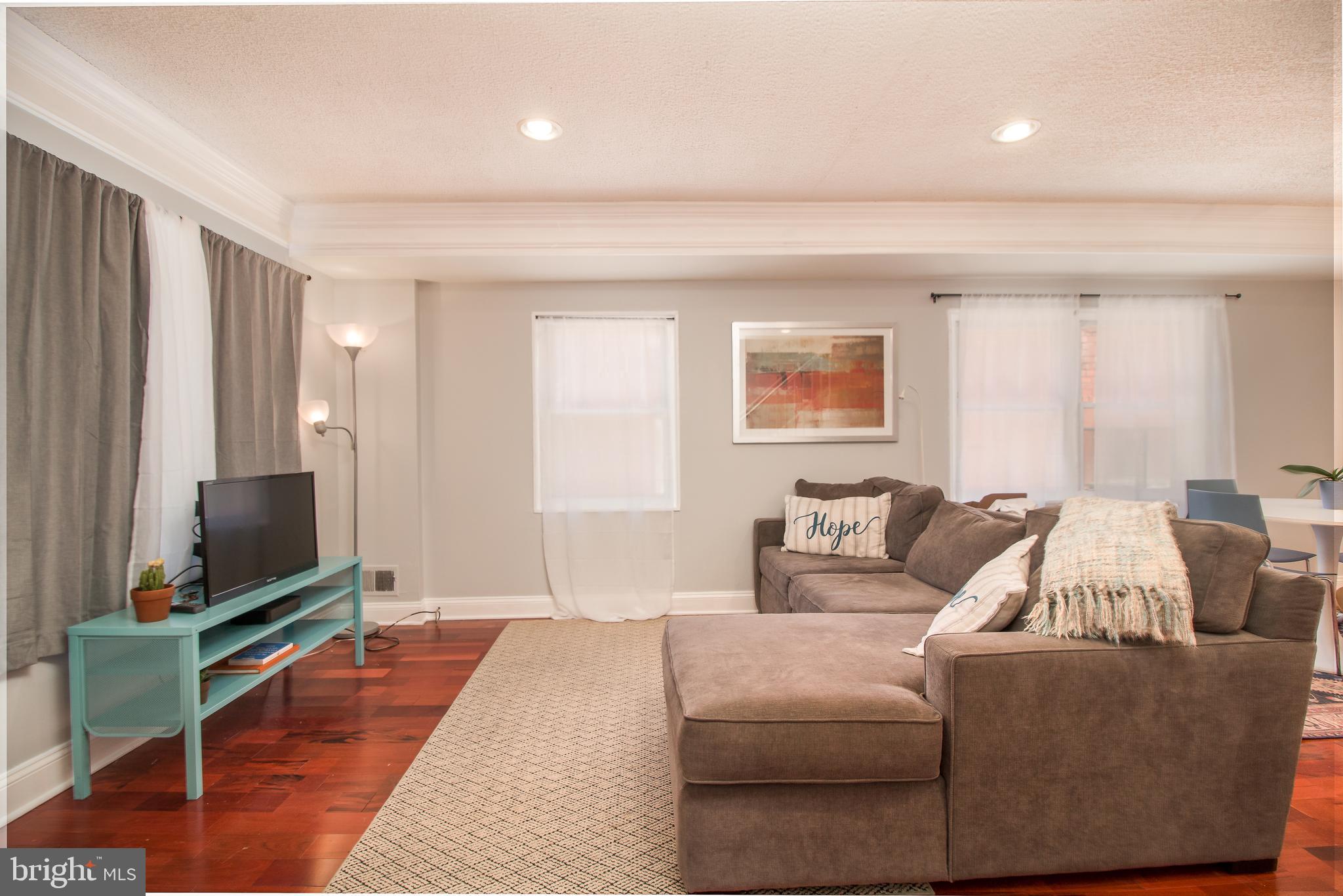 708 Four Mile Road Alexandria, VA 22305 - Photo 2 of 19 The door opens to your spacious living room!