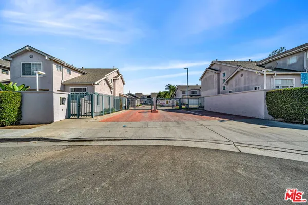 a view of a house with a street