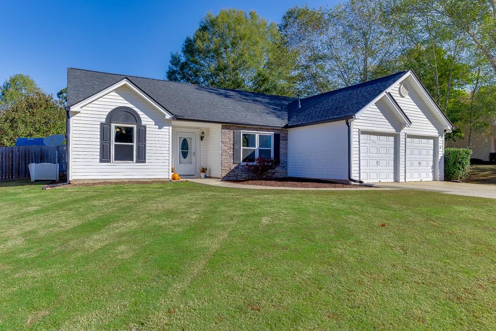 4310 Ridgebrook Bend Cumming, GA 30028 - Photo 1 of 1 a view of outdoor space yard and front view of a house
