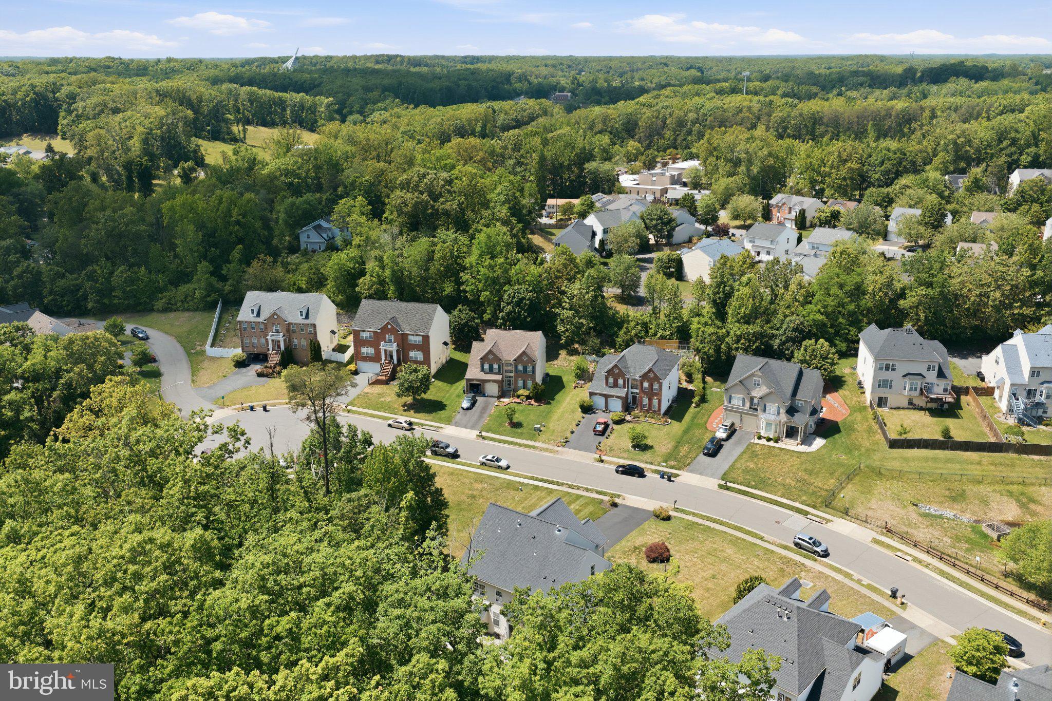 3679 Expedition Drive Triangle, VA 22172 - Photo 60 of 65 an aerial view of a house with yard swimming pool and outdoor seating