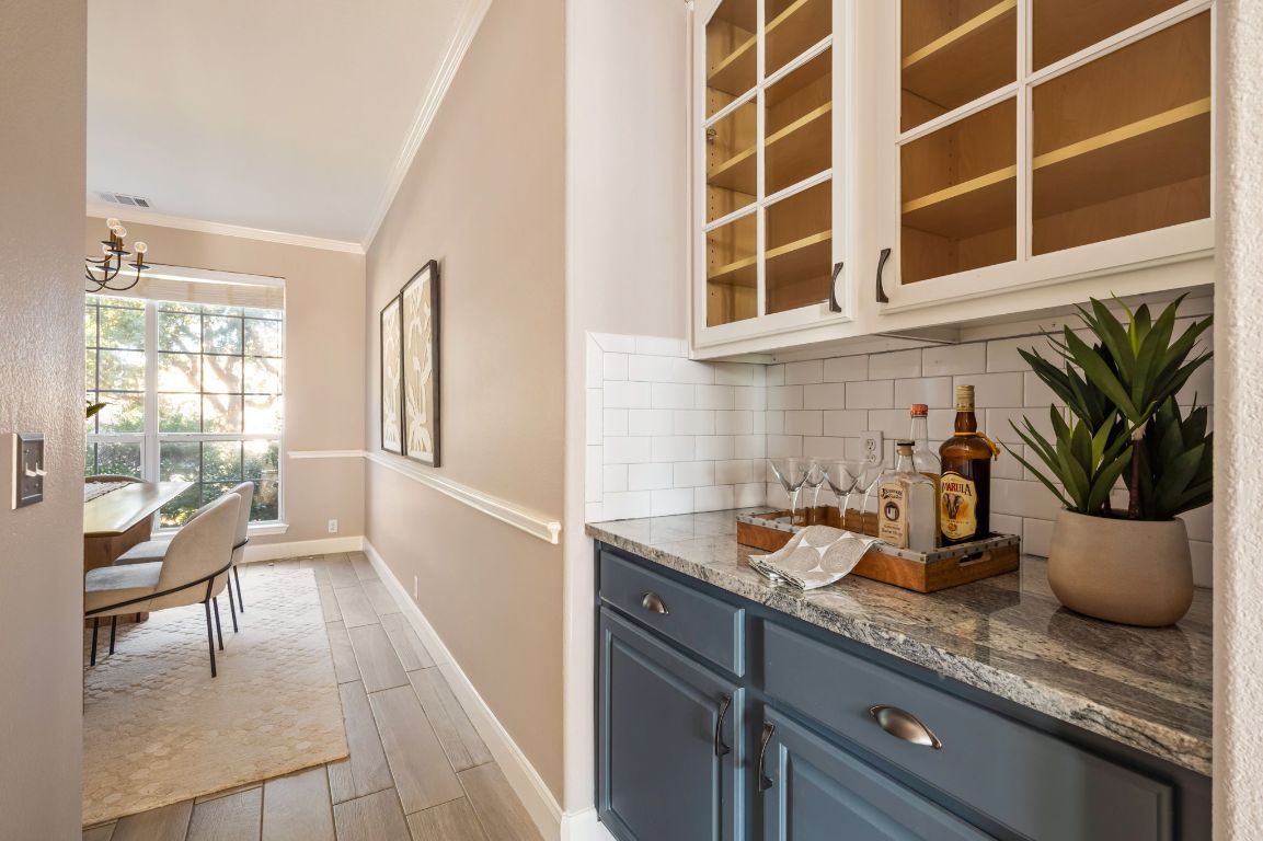 8101 Red Bird Court Austin, TX 78726 - Photo 14 of 33 a kitchen with a sink and a large window