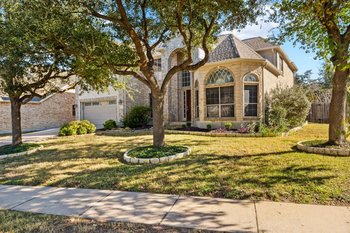 8101 Red Bird Court Austin, TX 78726 - Photo 2 of 33 a view of a house with snow on the tree